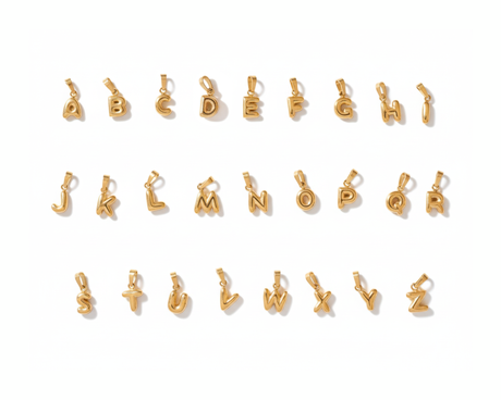 Gold alphabet bubble letter initial charms on a white background