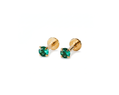 Gold labret flat back stud earrings with green gemstones, made from tarnish proof waterproof surgical steel, on a white background