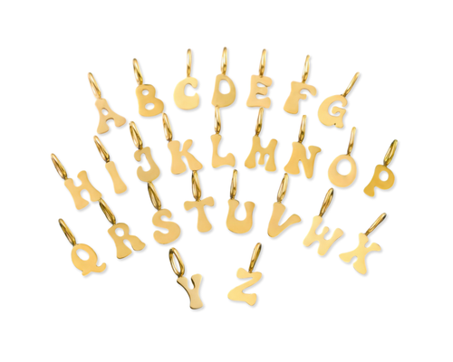 A full alphabet of Gold Initial letter jewellery charms, made from tarnish proof waterproof surgical stainless steel, on a white background.